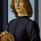 Portrait of a Young Man Holding a Medallion